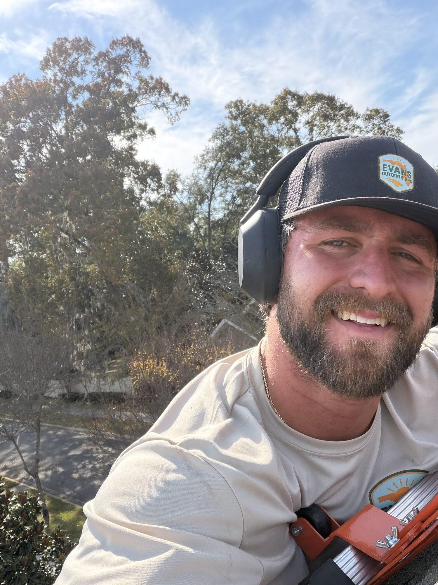 Evans Outdoor Ops owner at work on a property