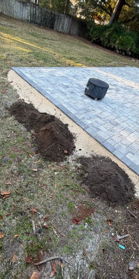 Paver Patio Edge Reset — before